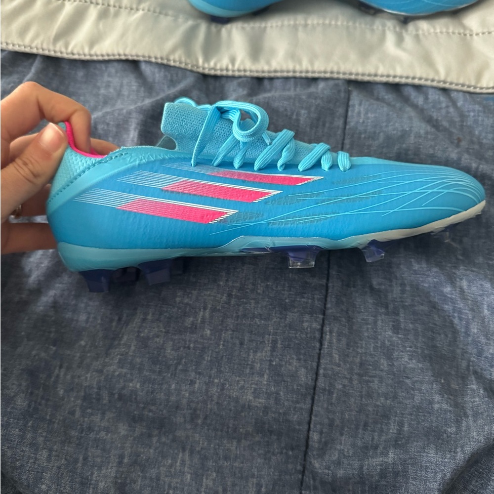 adidas’s speedflow Messi Kids cleats - Blue and Pink